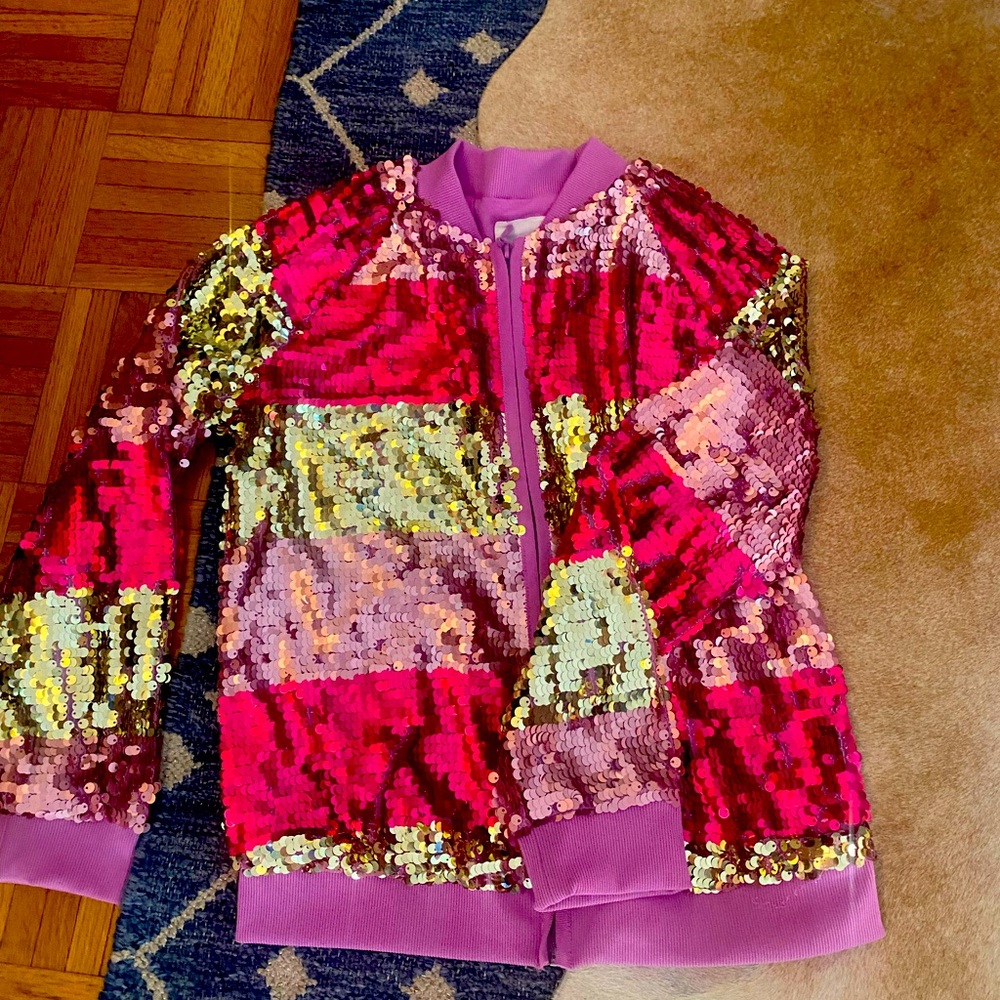 A cat and Jack jacket with reversible sequences.